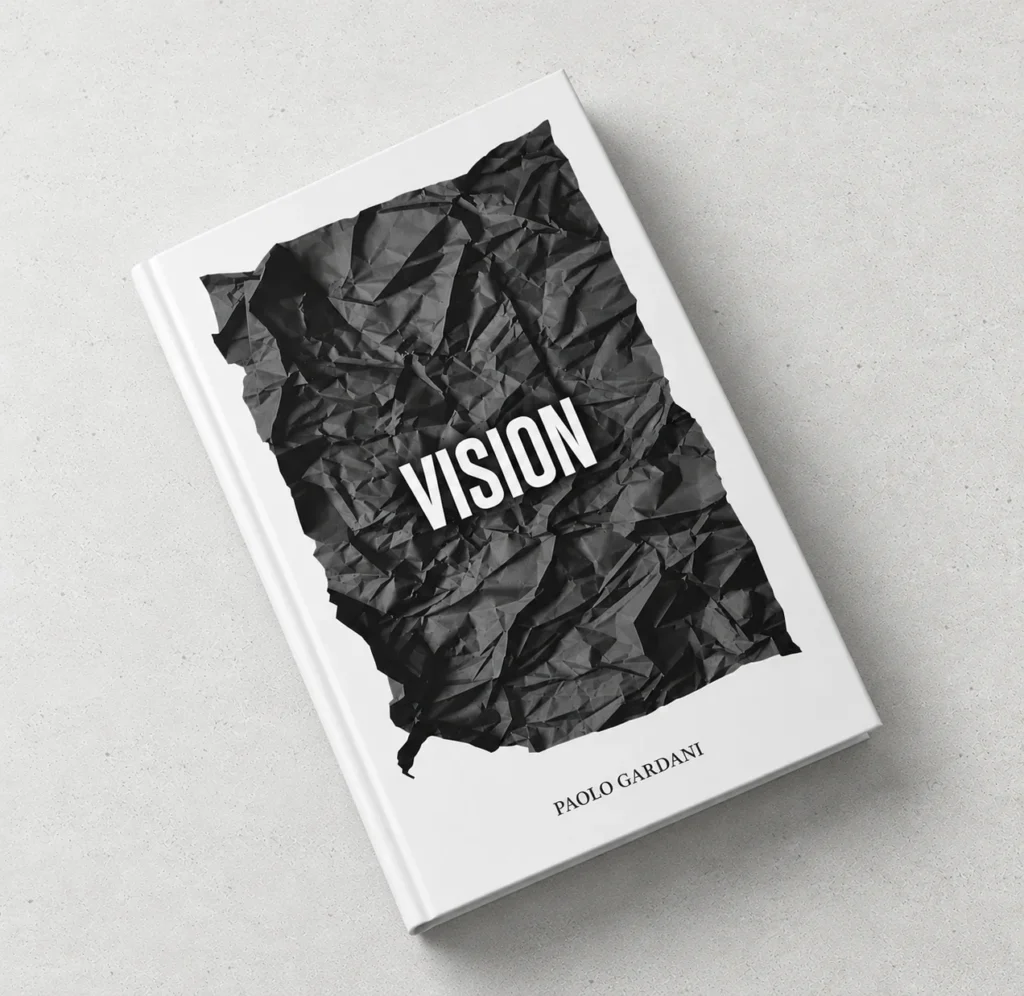 Copertina del libro Vision di Paolo Gardani, con grafica di carta nera stropicciata e titolo bianco su sfondo chiaro.